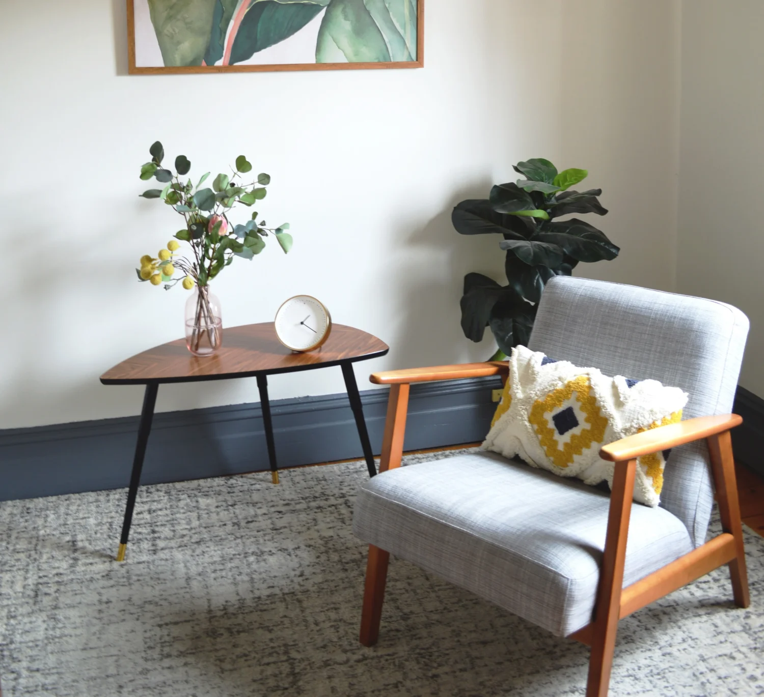 A chair and side table in a therapy room
