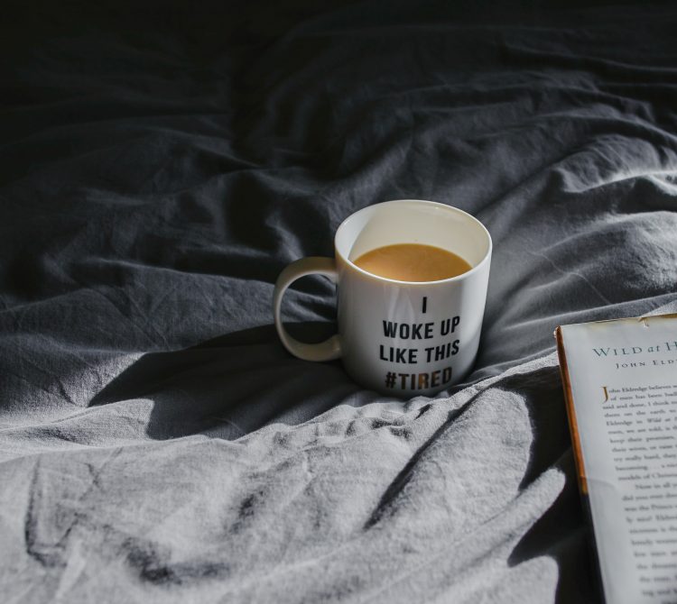 coffee cup on bed