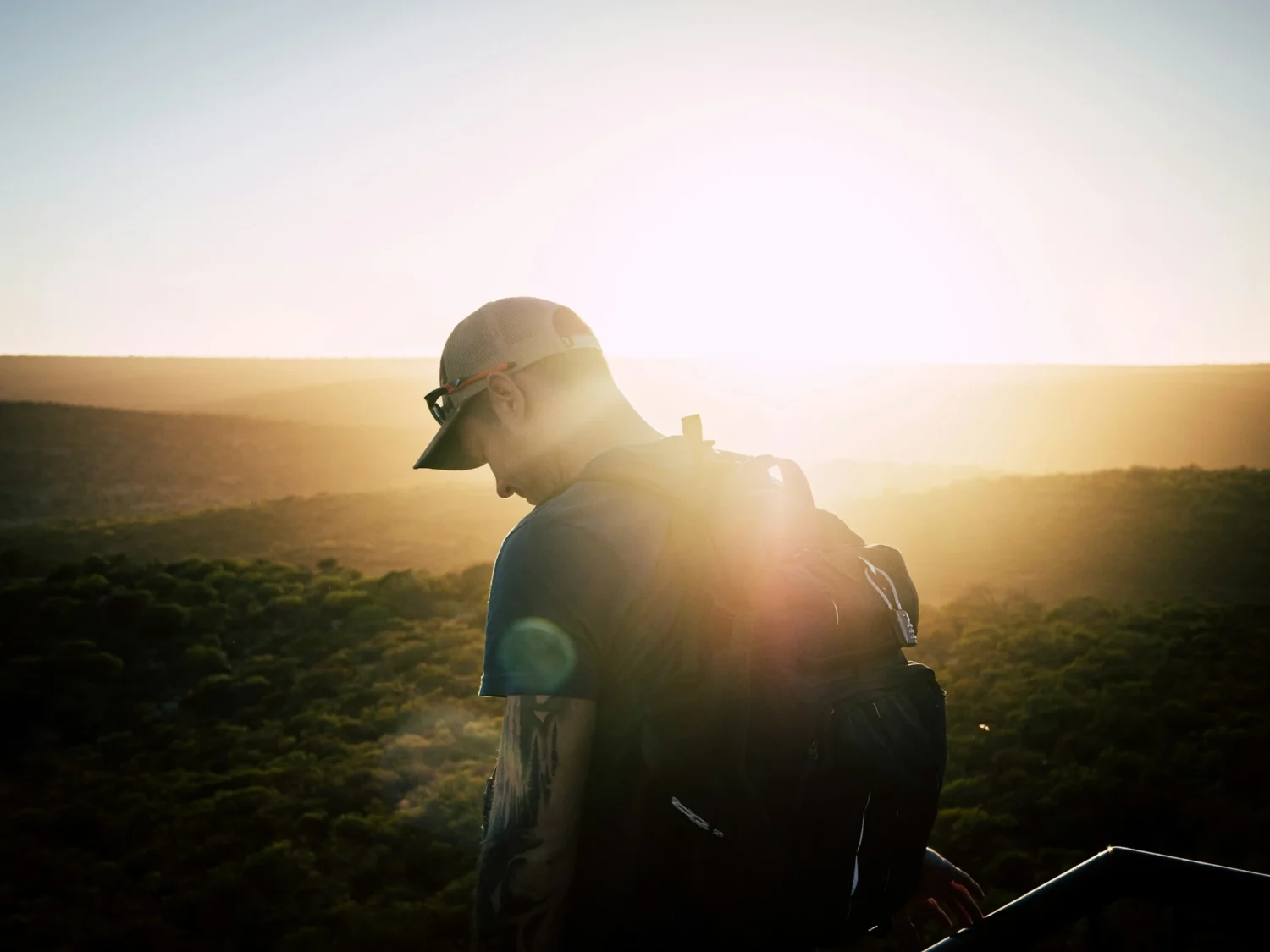 A man walking outdoors in nature