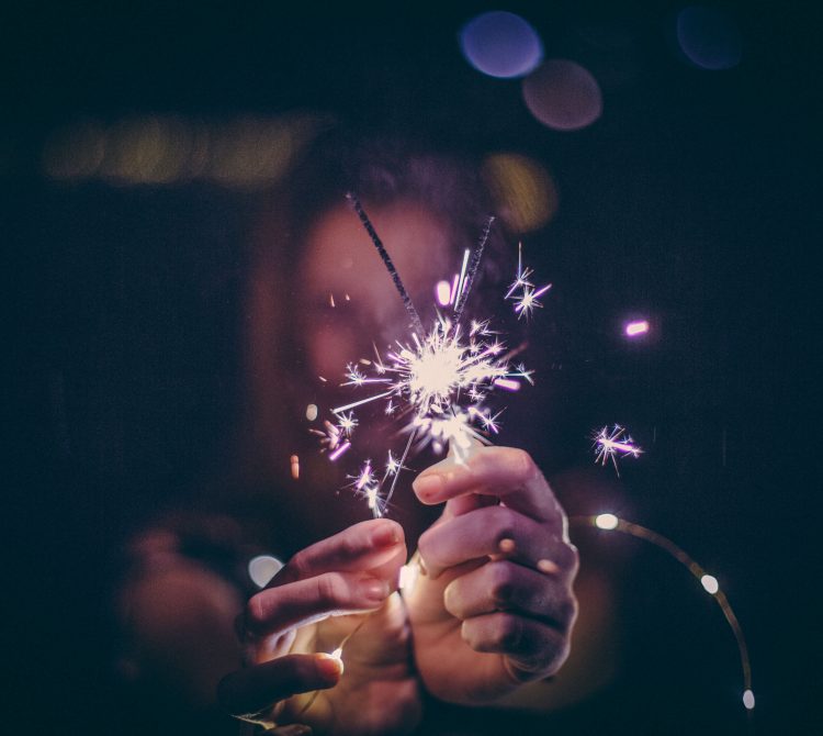 Girl holding sparklers
