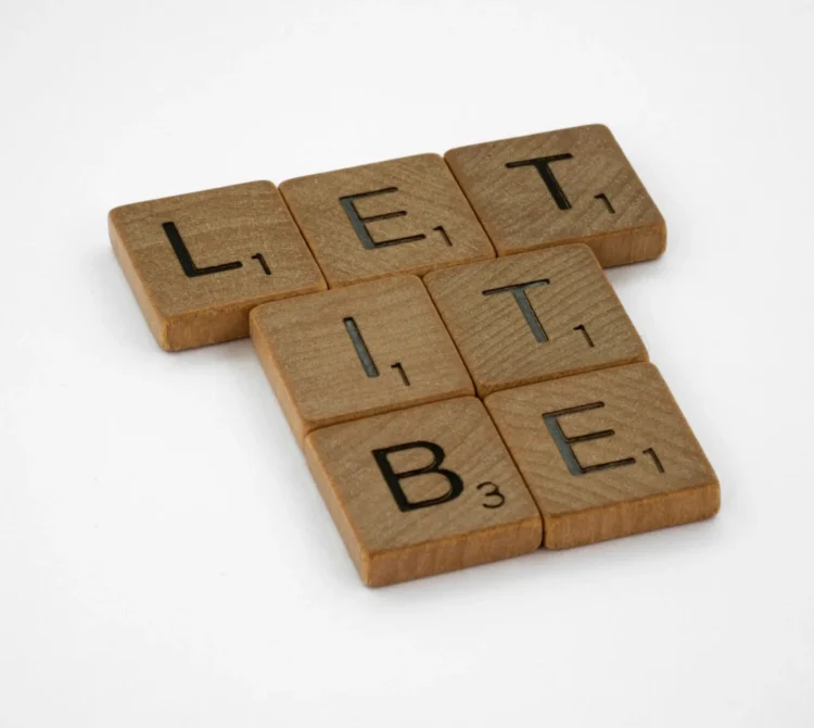 Wooden letter tiles spelling 