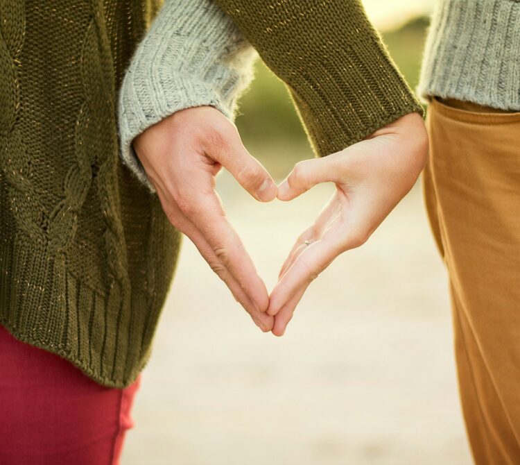 Two hands held together to make the shape of a heart
