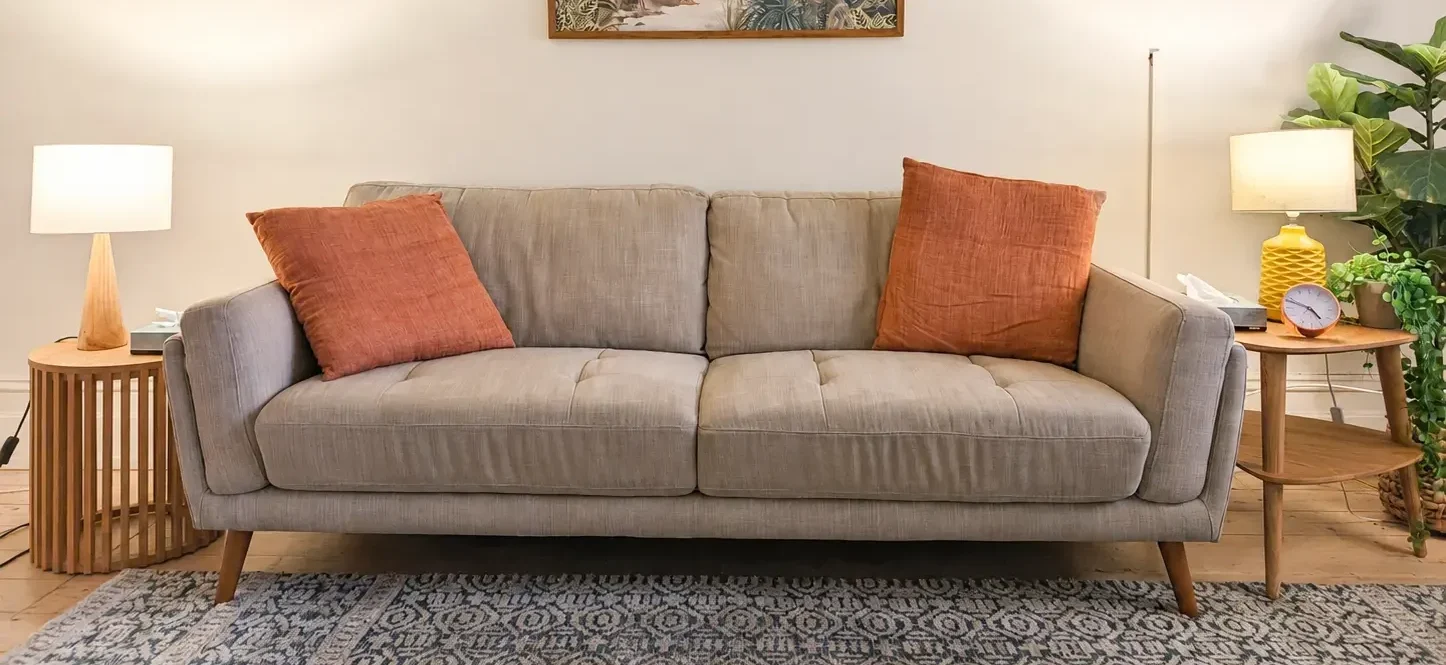 Armadale therapy room with long couch and warm lighting at Peaceful Mind Psychology