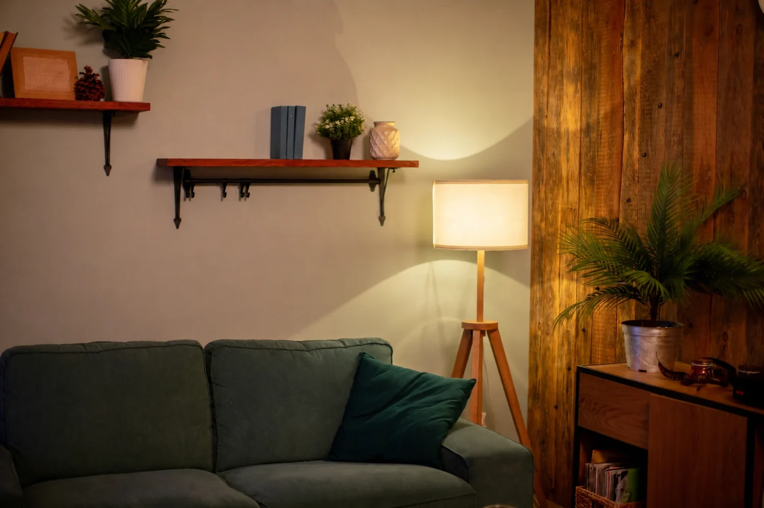Rustic style room with long couch and warm lighting
